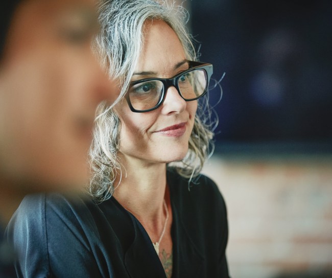 Close-up of a woman during a team meeting