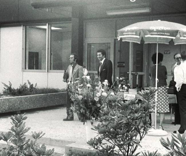 Festively dressed people on the terrace