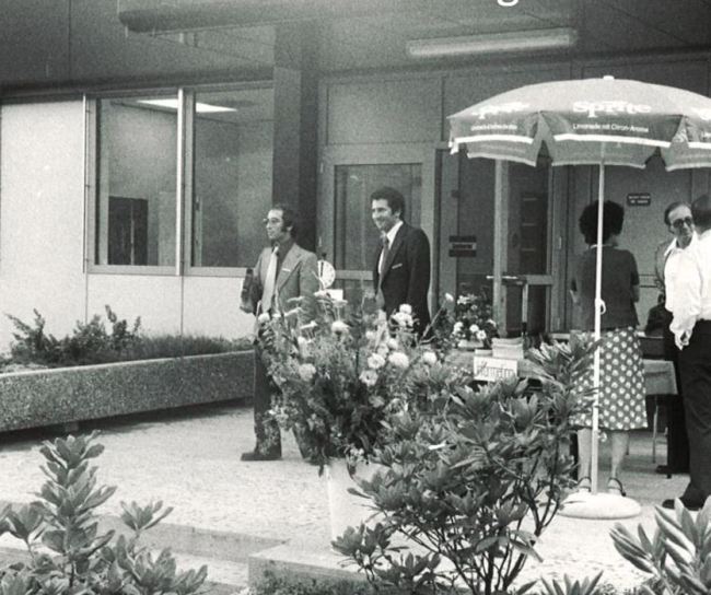 Festively dressed people on the terrace