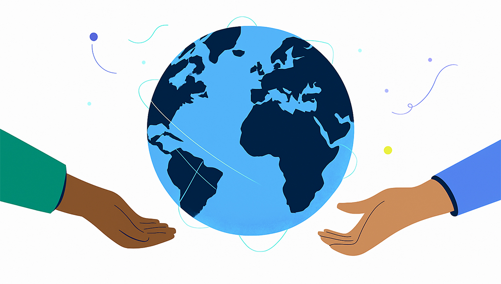 Picture: the earth globe surrounded by two outstretched hands